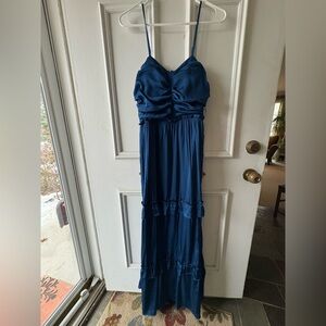 New with tags, floor length, adjustable straps, blue dress teared with ruffles